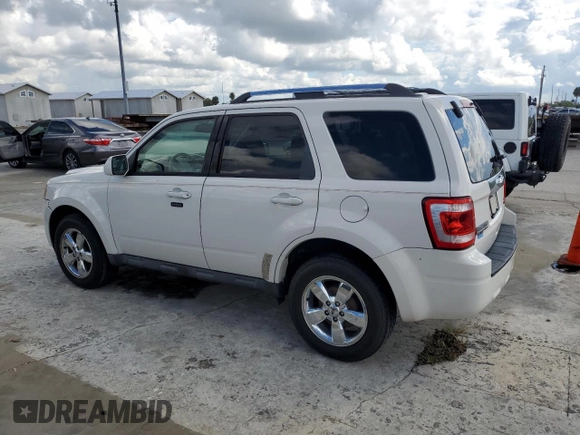 2012 Ford Escape Limited with VIN 1FMCU0EG3CKB49563, listed as a Copart auction lot 74003184 with 115,060 mi miles and Salvage Title. Bid and sale history available at carsss.com. Image 2.