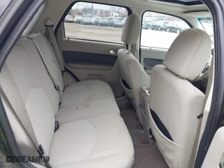 2009 Mercury Mariner Hybrid with VIN 4M2CU29359KJ09642, listed as a IAAI auction lot 41734762 with 233,989 mi miles. Bid and sale history available at carsss.com. Image 8.