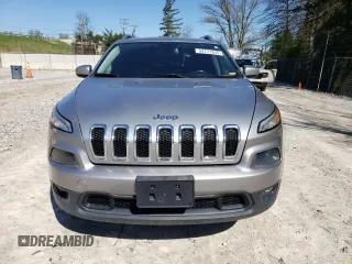 2014 Jeep Cherokee Latitude with VIN 1C4PJMCS0EW200588, listed as a Copart auction lot 54171255 with 196,247 mi miles and Salvage Title. Bid and sale history available at DreamBid. Image 5.