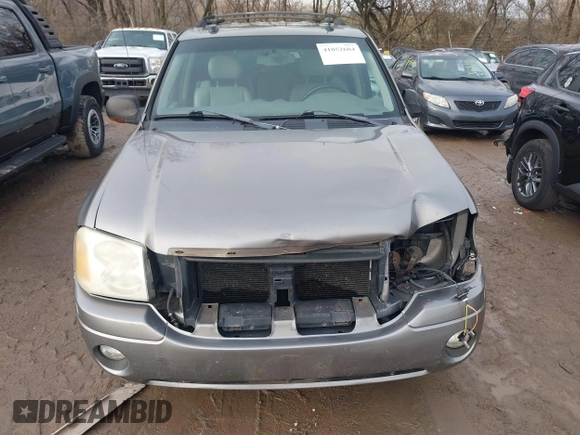 2005 GMC Envoy SLT with VIN 1GKDT13S752276414, listed as a IAAI auction lot 41052684 with 200,919 mi miles. Bid and sale history available at carsss.com. Image 6.