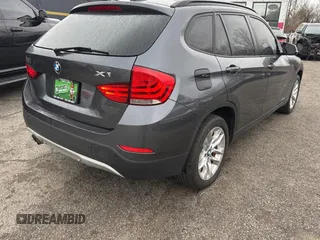 2015 BMW X1 xDrive28i with VIN WBAVL1C53FVY34430, listed as a Copart auction lot 49547905 with 87,431 mi miles and Clean Title. Bid and sale history available at carsss.com. Image 4.