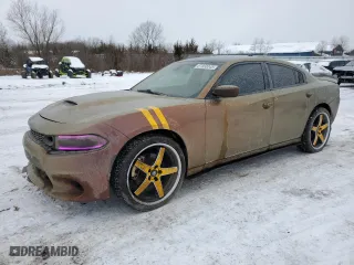 2017 Dodge Charger SXT with VIN 2C3CDXJGXHH557676, listed as a Copart auction lot 87850045 with 79,316 mi miles and Salvage Title. Bid and sale history available at carsss.com. Image 1.