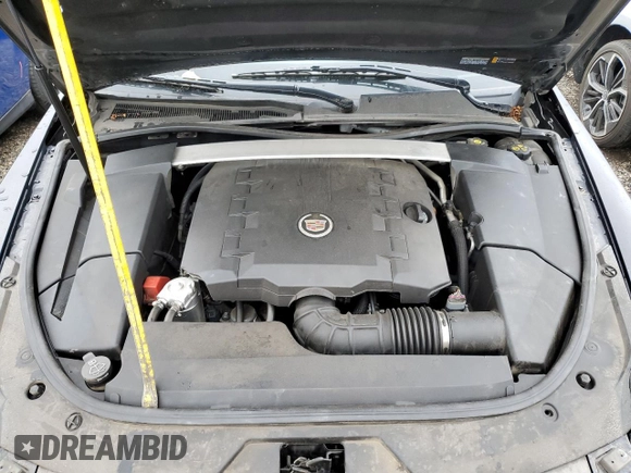 2011 Cadillac CTS Luxury z VIN 1G6DG5EY3B0161943, wystawiony jako Copart lot #54496845 z przebiegiem 148 305 mil mil oraz Szkoda całkowita • Salvage title. Historia ofert i sprzedaży dostępna na DreamBid. Obrazek 11.