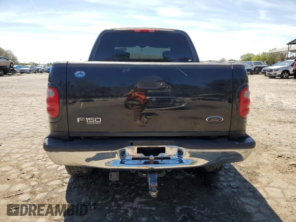 2003 Ford F-150 XLT with VIN 1FTRW08L63KB47470, listed as a Copart auction lot 50400055 with 223,859 mi miles and Salvage Title. Bid and sale history available at carsss.com. Image 6.