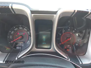 2014 Chevrolet Camaro LS z VIN 2G1FA1E36E9246671, wystawiony jako IAAI lot #41770553 z przebiegiem 170 121 mil mil oraz . Historia ofert i sprzedaży dostępna na DreamBid. Obrazek 7.