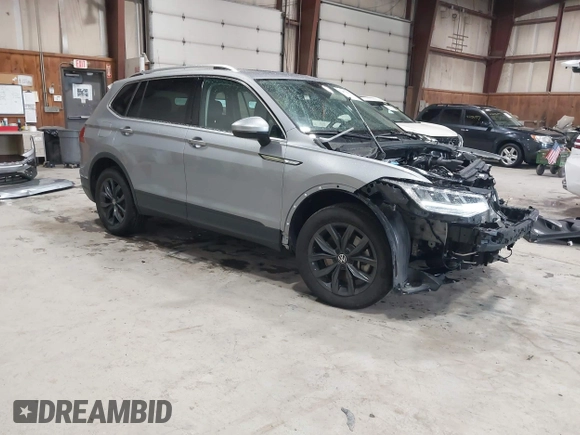 2024 Volkswagen Tiguan SE with VIN 3VVMB7AX8RM084483, listed as a IAAI auction lot 42452619 with 14,618 mi miles and . Bid and sale history available at DreamBid. Image 1.