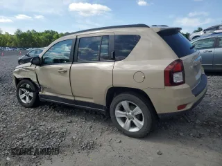 2017 Jeep Compass Sport SE with VIN 1C4NJCBA4HD123119, listed as a Copart auction lot 58787565 with 104,500 mi miles and Salvage title. Bid and sale history available at DreamBid. Image 2.