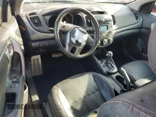 2012 Kia Forte SX с VIN KNAFW6A39C5475297, выставлен на аукционе Copart как лот 51008605 с пробегом 125 229 миль миль и Списание • Salvage title. История ставок и продаж доступна на DreamBid. Изображение 8.