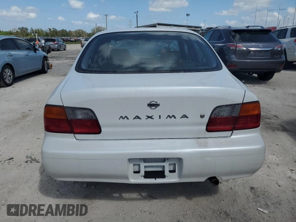 1995 Nissan Maxima GLE с VIN JN1CA21D6ST059369, выставлен на аукционе Copart как лот 74794884 с пробегом 246 806 миль миль и Списание • Salvage title. История ставок и продаж доступна на DreamBid. Изображение 6.