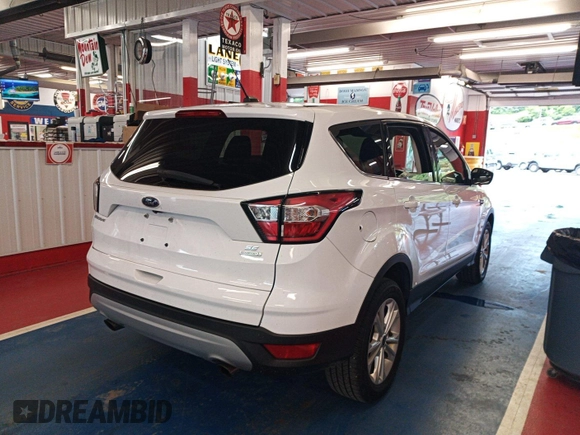 2017 Ford Escape SE z VIN 1FMCU0GD2HUD67783, wystawiony jako IAAI lot #42575794 z przebiegiem 98 188 mil mil oraz . Historia ofert i sprzedaży dostępna na DreamBid. Obrazek 15.