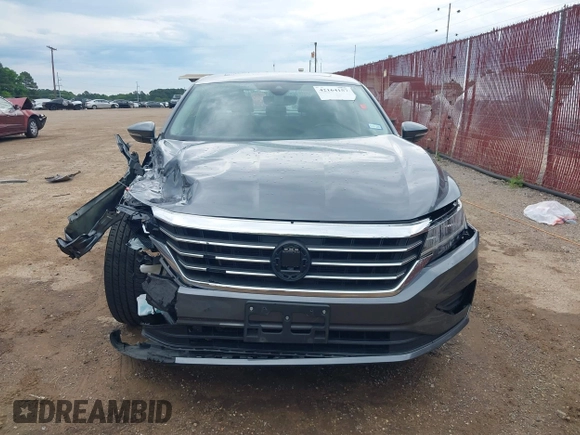 2021 Volkswagen Passat SE with VIN 1VWSA7A34MC019045, listed as a IAAI auction lot 42164157 with 78,436 mi miles and . Bid and sale history available at DreamBid. Image 12.