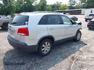 2013 Kia Sorento LX with VIN 5XYKT3A6XDG361675, listed as a IAAI auction lot 42402112 with 172,414 mi miles and . Bid and sale history available at DreamBid. Image 4.