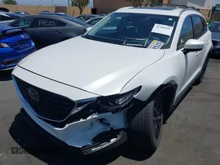 2023 Mazda CX-9 Touring Plus with VIN JM3TCBAY7P0636047, listed as a IAAI auction lot 42309618 with 20,821 mi miles and . Bid and sale history available at DreamBid. Image 18.