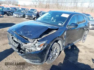 2017 Mazda CX-5 Grand Touring with VIN JM3KFBDL0H0104806, listed as a IAAI auction lot 41621964 with 60,728 mi miles. Bid and sale history available at carsss.com. Image 2.