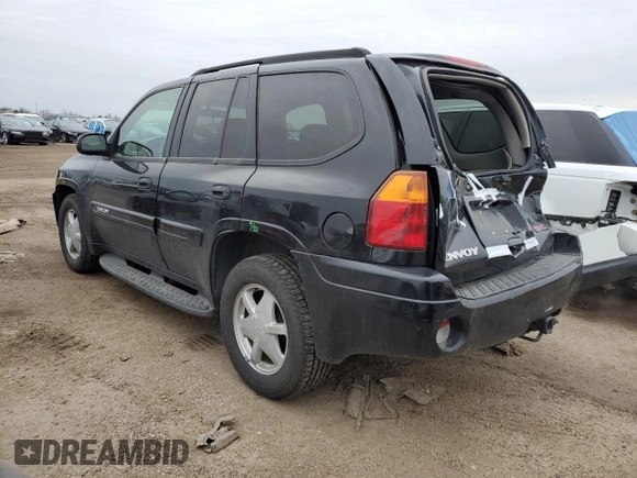 2003 GMC Envoy SLE with VIN 1GKDT13S532122751, listed as a Copart auction lot 46166415 with 139,621 mi miles and Salvage Title. Bid and sale history available at carsss.com. Image 2.