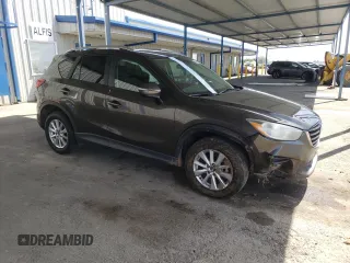 2016 Mazda CX-5 Touring z VIN JM3KE2CY4G0805072, wystawiony jako Copart lot #58435535 z przebiegiem 146 323 mil mil oraz Szkoda całkowita • Salvage title. Historia ofert i sprzedaży dostępna na DreamBid. Obrazek 4.