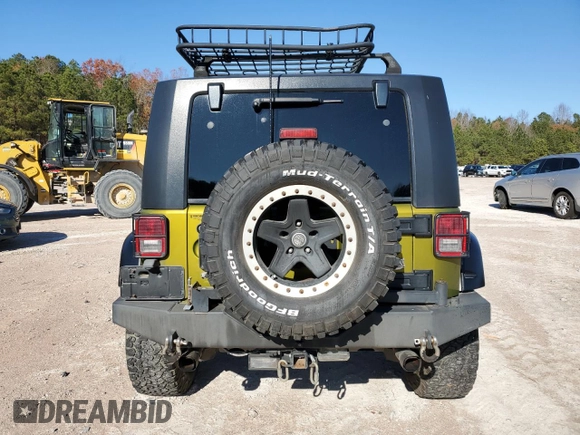 2008 Jeep Wrangler Rubicon с VIN 1J4GA64198L518646, выставлен на аукционе Copart как лот 82381084 с пробегом Не указан миль и Списание • Salvage title. История ставок и продаж доступна на DreamBid. Изображение 6.