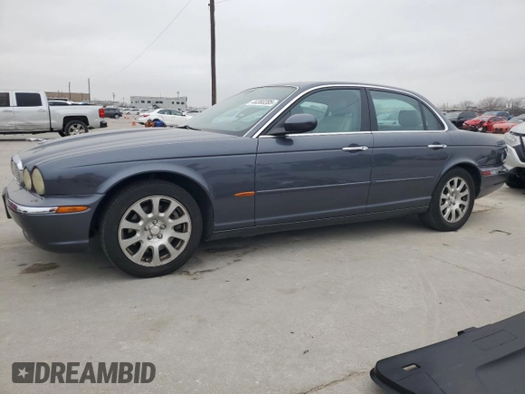 2004 Jaguar XJ with VIN SAJWA71C04SG22878, listed as a Copart auction lot 44383205 with 127,515 mi miles and Clean Title. Bid and sale history available at carsss.com. Image 1.