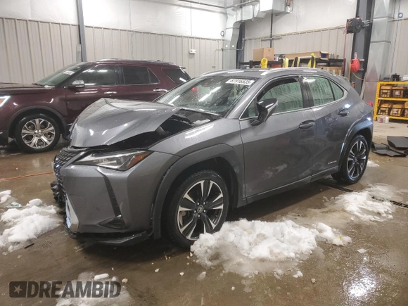 2021 Lexus UX 250h z VIN JTHX9JBH8M2047296, wystawiony jako Copart lot #87916535 z przebiegiem 10 297 mil mil oraz Szkoda całkowita • Salvage title. Historia ofert i sprzedaży dostępna na DreamBid. Obrazek 1.