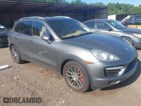 2012 Porsche Cayenne Turbo z VIN WP1AC2A29CLA81105, wystawiony jako IAAI lot #42618593 z przebiegiem 173 873 mil mil oraz . Historia ofert i sprzedaży dostępna na DreamBid. Obrazek 1.