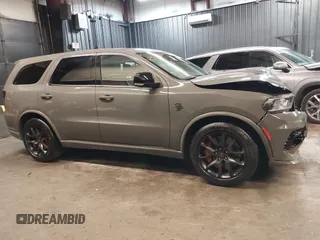 2023 Dodge Durango SRT Hellcat Premium with VIN 1C4SDJH9XPC655507, listed as a IAAI auction lot 42172418 with 1,490 mi miles and . Bid and sale history available at DreamBid. Image 14.