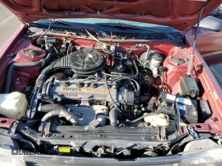1989 Toyota Corolla with VIN JT2AE92E4K0112945, listed as a Copart auction lot 83382604 with 209,462 mi miles and Salvage title. Bid and sale history available at DreamBid. Image 11.