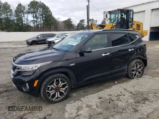 2023 Kia Seltos SX with VIN KNDETCA24P7420151, listed as a Copart auction lot 48660895 with 25,274 mi miles and Salvage title. Bid and sale history available at DreamBid. Image 1.