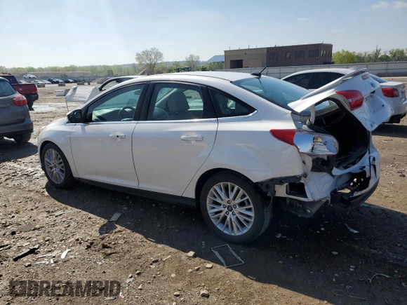 2018 Ford Focus Titanium with VIN 1FADP3J21JL294061, listed as a Copart auction lot 53827375 with 194,577 mi miles and Salvage title. Bid and sale history available at DreamBid. Image 2.