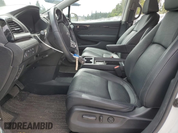 2022 Honda Odyssey Touring with VIN 5FNRL6H8XNB016064, listed as a Copart auction lot 65289595 with 24,946 mi miles and Salvage title. Bid and sale history available at DreamBid. Image 7.
