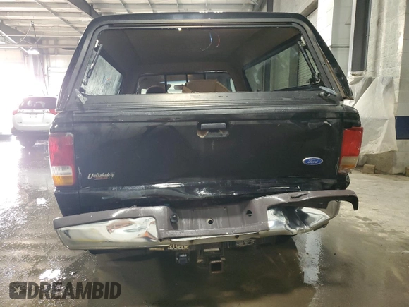 1997 Ford Ranger XLT with VIN 1FTCR11X9VTA43729, listed as a Copart auction lot 80646164 with 207,830 mi miles and Salvage title. Bid and sale history available at DreamBid. Image 6.