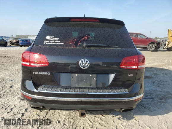 2016 Volkswagen Touareg Sport with VIN WVGEF9BP7GD010767, listed as a Copart auction lot 44782585 with 125,970 mi miles and Salvage Title. Bid and sale history available at DreamBid. Image 6.
