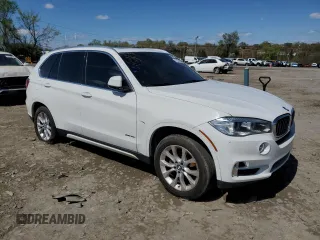 2014 BMW X5 xDrive35i with VIN 5UXKR0C58E0C27855, listed as a Copart auction lot 52254595 with 134,259 mi miles and Clean Title. Bid and sale history available at carsss.com. Image 4.