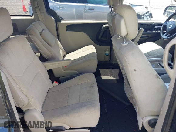2012 Dodge Grand Caravan SXT with VIN 2C4RDGCGXCR277505, listed as a IAAI auction lot 42194492 with 206,565 mi miles and . Bid and sale history available at DreamBid. Image 8.