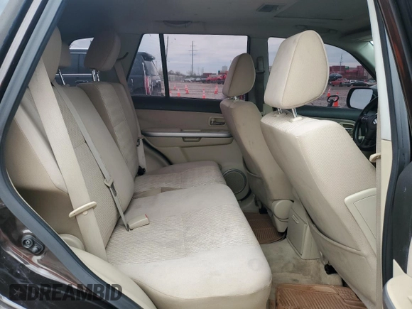 2013 Suzuki Grand Vitara z VIN JS3TE0D44D4100033, wystawiony jako Copart lot #51648665 z przebiegiem 151 879 mil mil oraz Czysty tytuł • Clean title. Historia ofert i sprzedaży dostępna na DreamBid. Obrazek 11.
