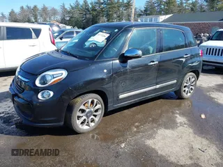2014 FIAT 500L Lounge with VIN ZFBCFACH5EZ006918, listed as a IAAI auction lot 41773284 with 94,600 mi miles and . Bid and sale history available at DreamBid. Image 2.