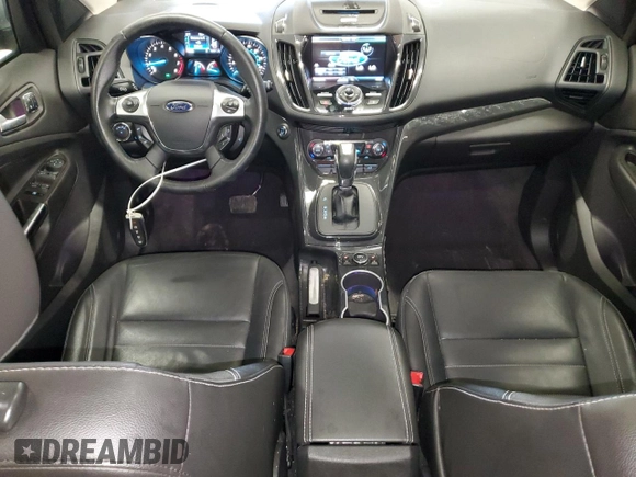 2014 Ford Escape Titanium с VIN 1FMCU0J94EUD41993, выставлен на аукционе Copart как лот 56933605 с пробегом 104 011 миль миль и Списание • Salvage title. История ставок и продаж доступна на DreamBid. Изображение 8.