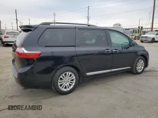 2015 Toyota Sienna XLE с VIN 5TDYK3DC6FS561960, выставлен на аукционе Copart как лот 59607355 с пробегом 110 593 миль миль и Списание • Salvage title. История ставок и продаж доступна на DreamBid. Изображение 3.