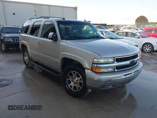 2005 Chevrolet Tahoe LT z VIN 1GNEC13T85R253599, wystawiony jako IAAI lot #41880298 z przebiegiem 155 337 mil mil oraz . Historia ofert i sprzedaży dostępna na DreamBid. Obrazek 1.