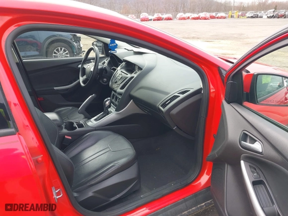 2013 Ford Focus SE with VIN 1FADP3F2XDL291995, listed as a IAAI auction lot 41949607 with 129,298 mi miles. Bid and sale history available at carsss.com. Image 5.