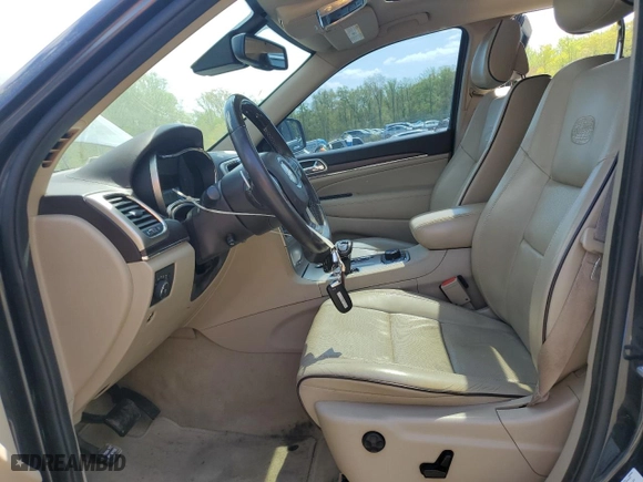 2014 Jeep Grand Cherokee Overland with VIN 1C4RJFCT1EC379867, listed as a Copart auction lot 54106375 with 217,908 mi miles and Clean Title. Bid and sale history available at carsss.com. Image 7.