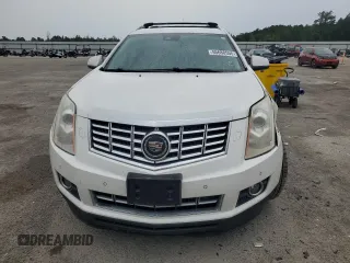 2013 Cadillac SRX Performance Collection z VIN 3GYFNHE33DS602428, wystawiony jako Copart lot #55688555 z przebiegiem 143 504 mil mil oraz Szkody całkowita. Historia ofert i sprzedaży dostępna na DreamBid. Obrazek 5.