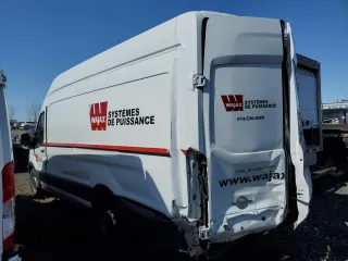 2015 Ford Transit with VIN 1FTSW3XV4FKA11624, listed as a Copart auction lot 52565755 with 147,353 mi miles and Salvage Title. Bid and sale history available at DreamBid. Image 2.