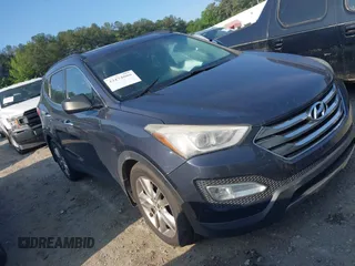 2013 Hyundai Santa Fe Sport z VIN 5XYZU3LA7DG006394, wystawiony jako IAAI lot #42174080 z przebiegiem 192 642 mil mil oraz . Historia ofert i sprzedaży dostępna na DreamBid. Obrazek 1.