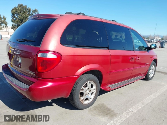 2001 Dodge Grand Caravan with VIN 2B4GT44L31R196487, listed as a IAAI auction lot 41762495 with 164,571 mi miles and . Bid and sale history available at DreamBid. Image 4.