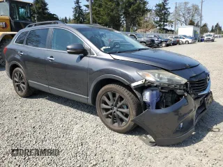 2014 Mazda CX-9 Grand Touring with VIN JM3TB3DV9E0439565, listed as a Copart auction lot 54515375 with 83,157 mi miles and Salvage Title. Bid and sale history available at DreamBid. Image 4.