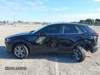 2023 Mazda CX-30 S Select with VIN 3MVDMBBM9PM508958, listed as a IAAI auction lot 42009029 with 21,219 mi miles and . Bid and sale history available at DreamBid. Image 15.