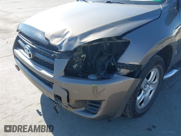 2009 Toyota RAV4 with VIN JTMZF33V395009905, listed as a IAAI auction lot 41881121 with 117,584 mi miles. Bid and sale history available at carsss.com. Image 12.