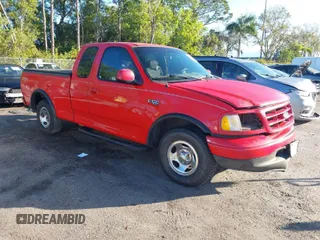 2002 Ford F-150 XL with VIN 1FTRX17232NB82055, listed as a IAAI auction lot 41146311 with 1 mi miles. Bid and sale history available at carsss.com. Image 1.