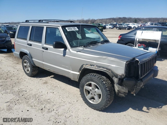 2000 Jeep Cherokee RH Drive with VIN 1J4FN28SXYL530123, listed as a Copart auction lot 49501305 with 241,860 mi miles and Salvage Title. Bid and sale history available at carsss.com. Image 4.