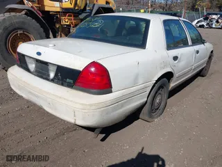 2010 Ford Crown Victoria with VIN 2FABP7AV6AX138688, listed as a IAAI auction lot 41774614 with 999,999 mi miles. Bid and sale history available at carsss.com. Image 4.